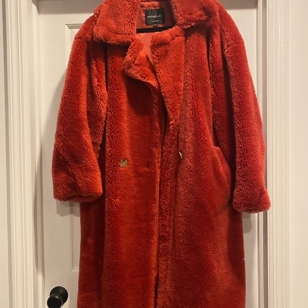Watermelon colored faux fur trench coat